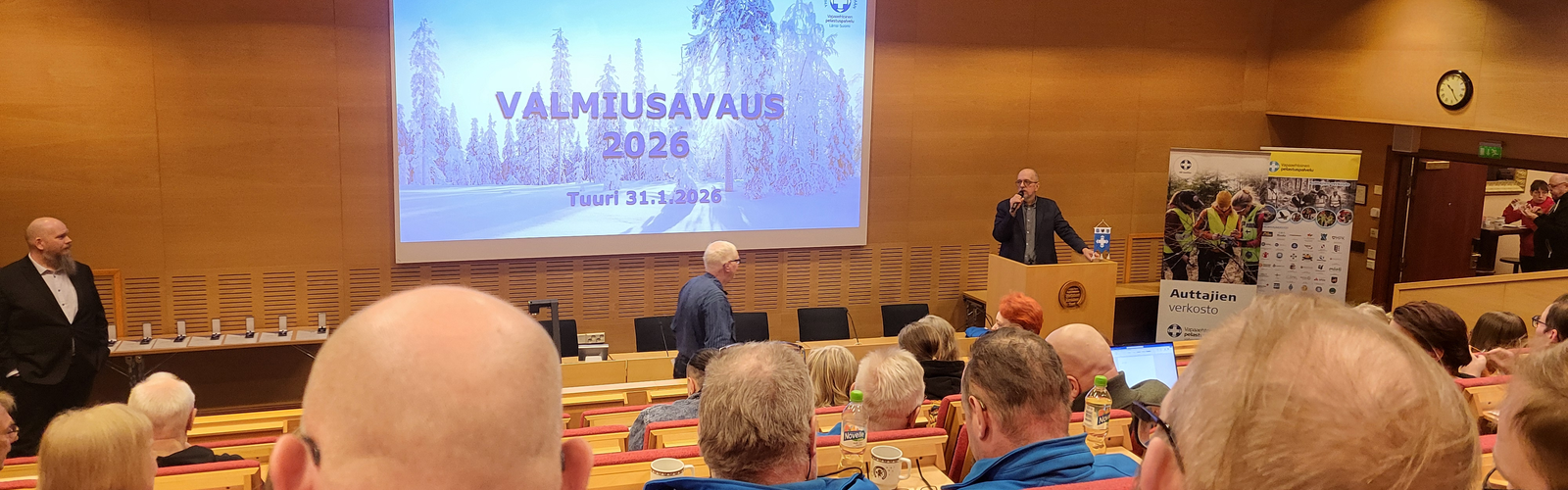 Väkeä auditoriossa